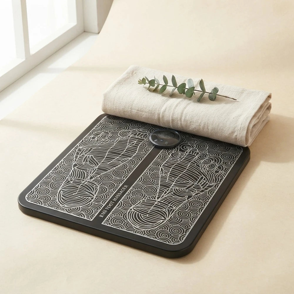 ClockOut Foot Reset Mat, a flat EMS foot massager mat